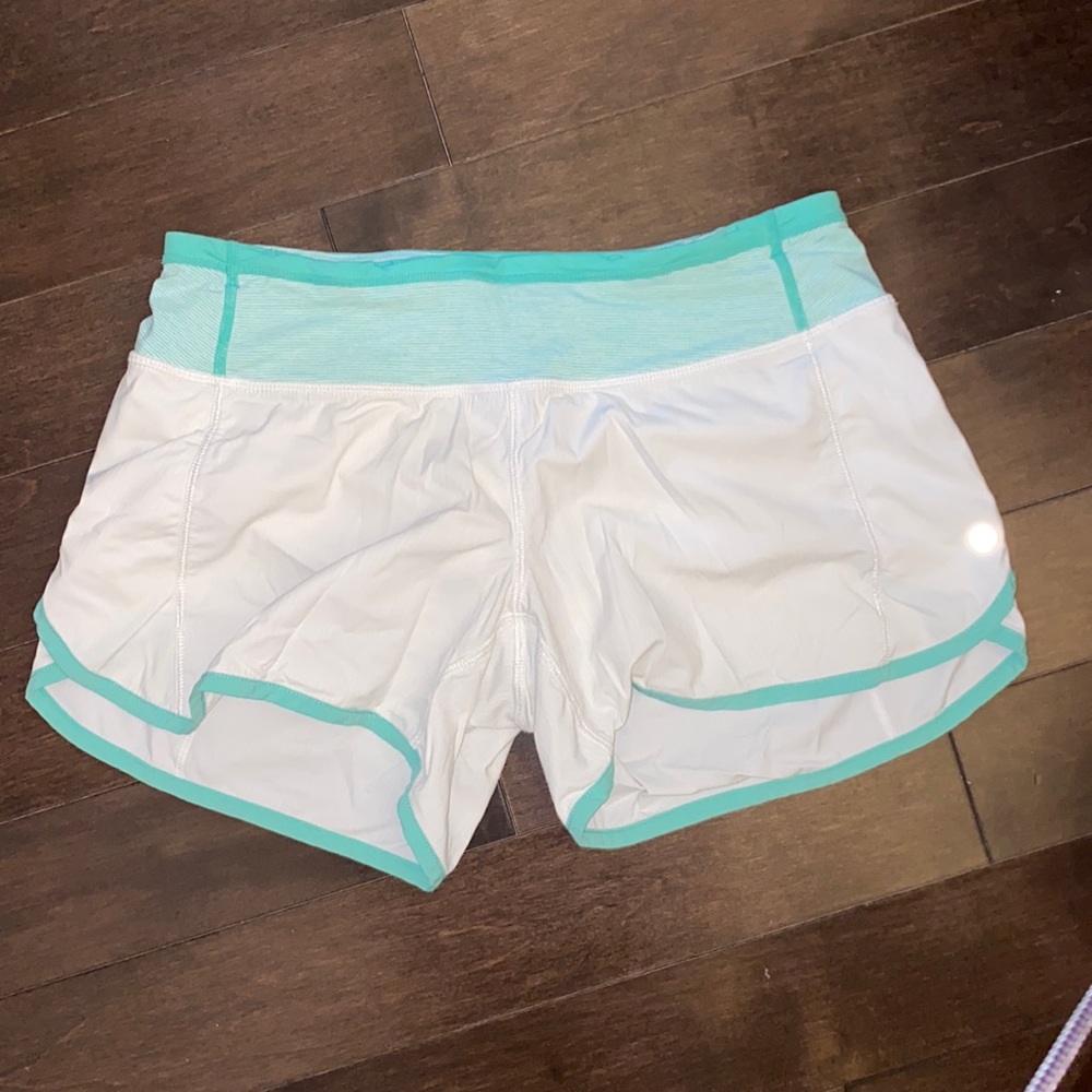Lululemon Speed Short - Size 4. White w/ Sea Green outline. Original Style.